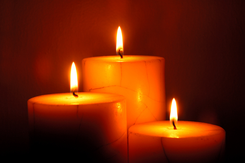 3 burning candles together